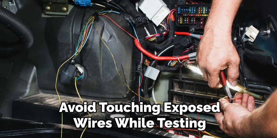Avoid Touching Exposed
Wires While Testing