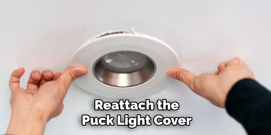 Reattach the
Puck Light Cover