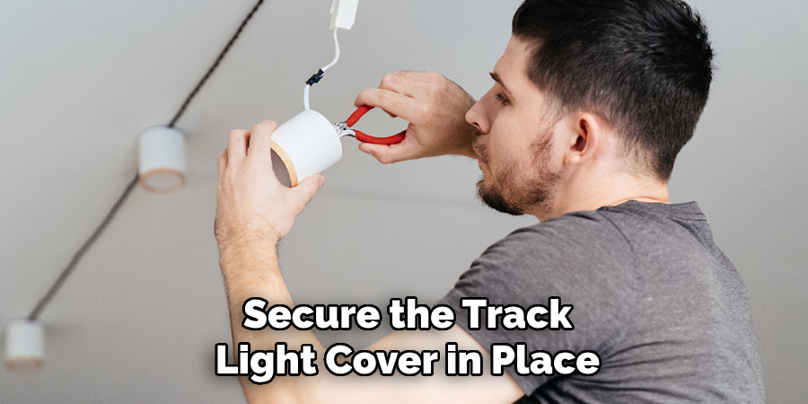 Secure the Track
Light Cover in Place