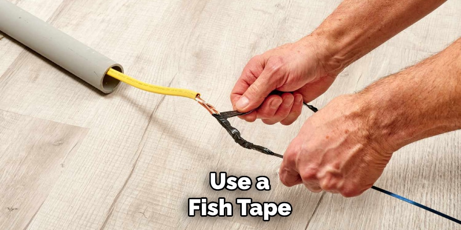 Use a
Fish Tape