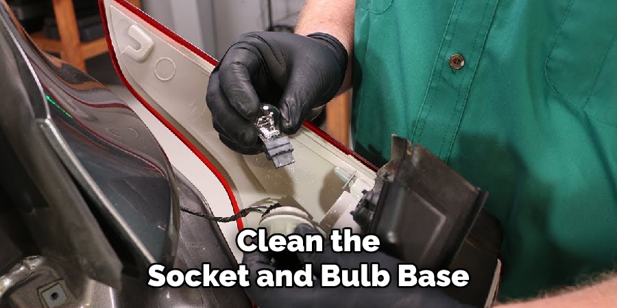 Clean the
Socket and Bulb Base