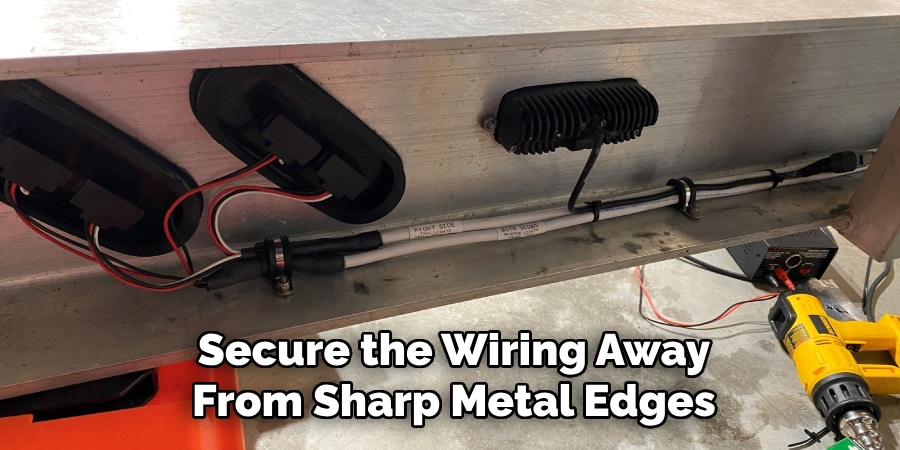 Secure the Wiring Away
From Sharp Metal Edges