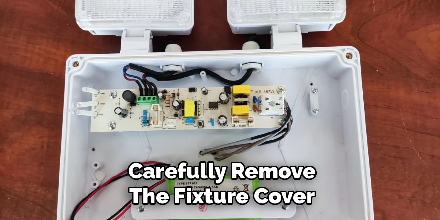 Carefully Remove
The Fixture Cover